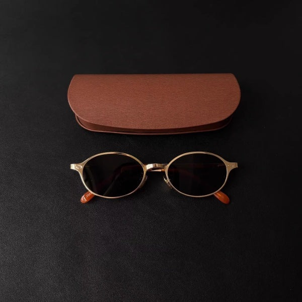 Retro Gold-Rimmed Black Tea Lenses Oval-Shaped