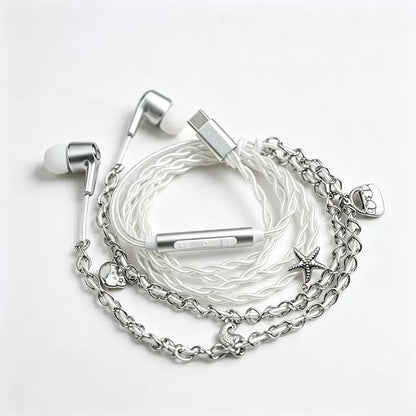 Diesel Wired Earbuds feature a distinct industrial style with silver-toned chains and charms attached to the cable.