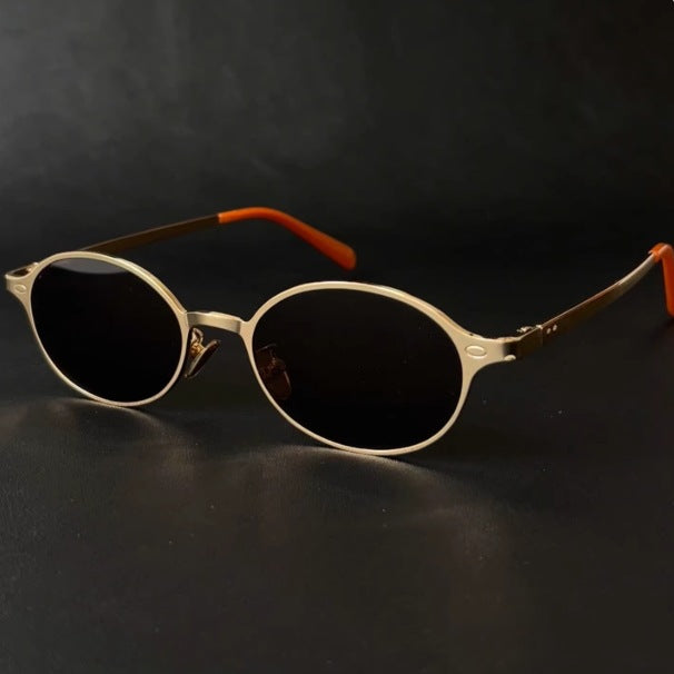 Retro Gold-Rimmed Black Tea Lenses Oval-Shaped